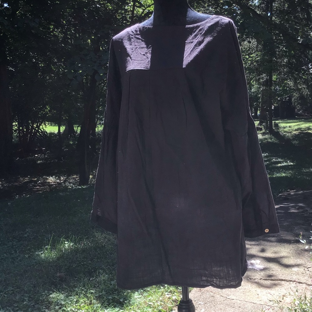 Zanzea long sleeve light weight linen type fabric.